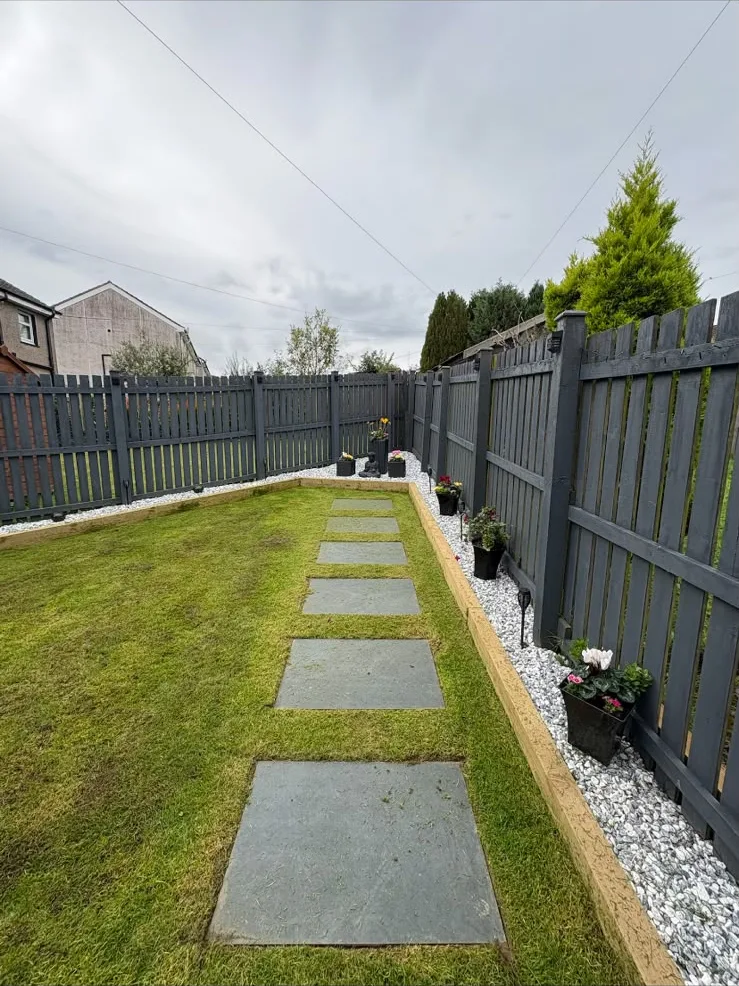 Stepping stones across the lawn with sleeper edging and chips, Ayr.