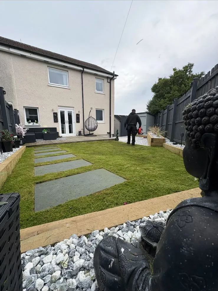 Lawn with stepping stones, sleeper edging and chips, Ayr.